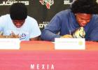 Four ’Cats sign to play football at the next level